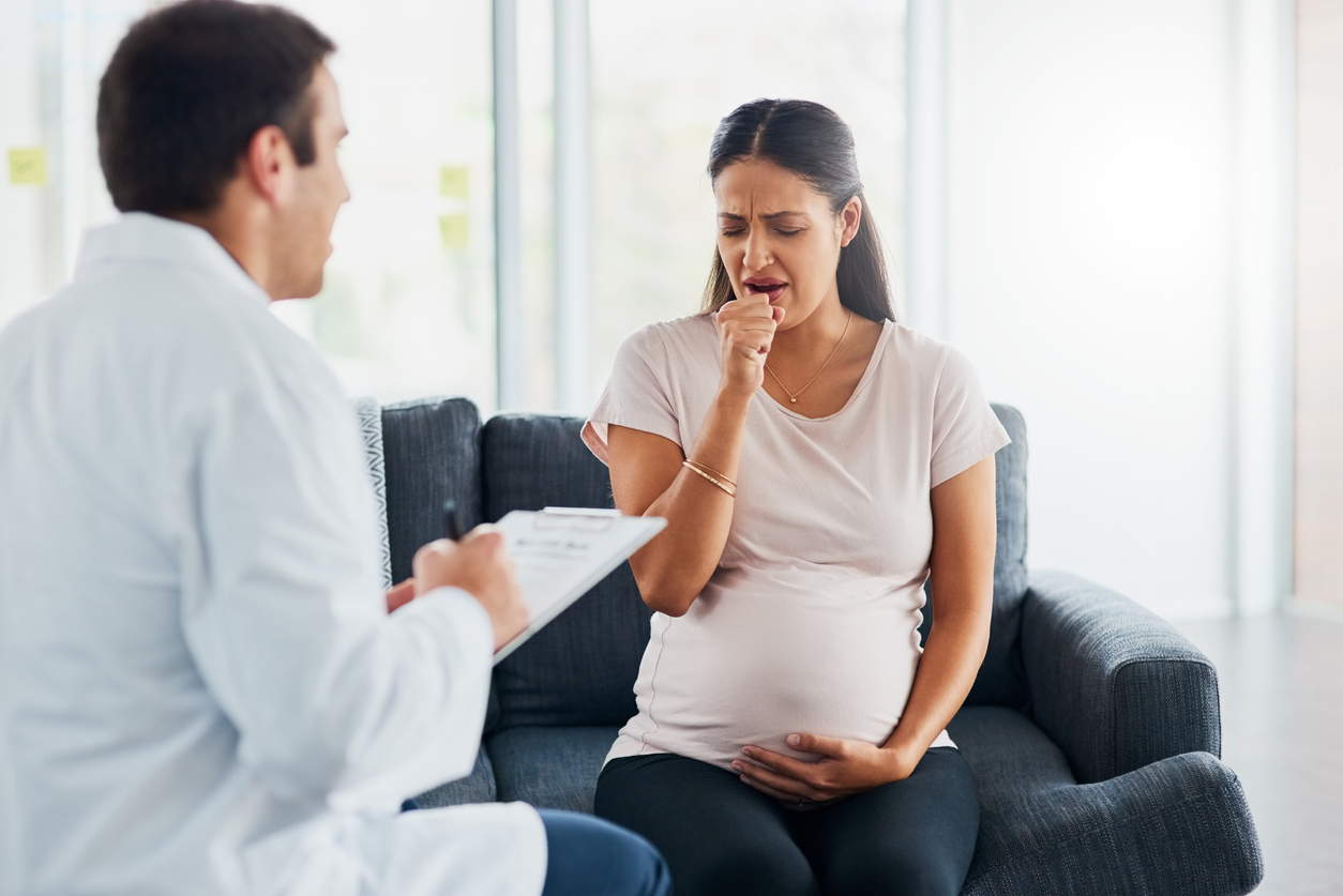 Coughing pregnant woman
