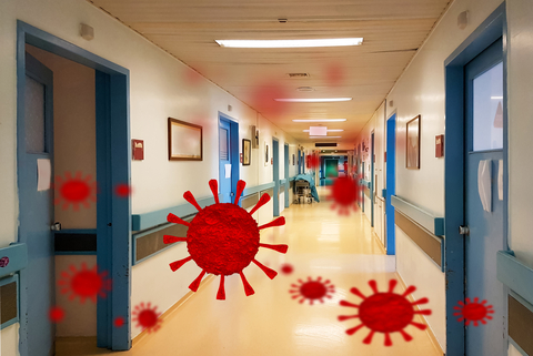 hospital corridor with Coronavirus particle images superimposed