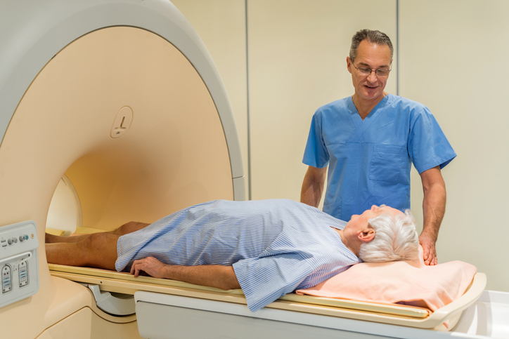 Senior man having MRI scan