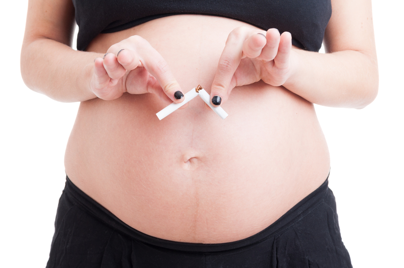 Pregnant woman quits smoking