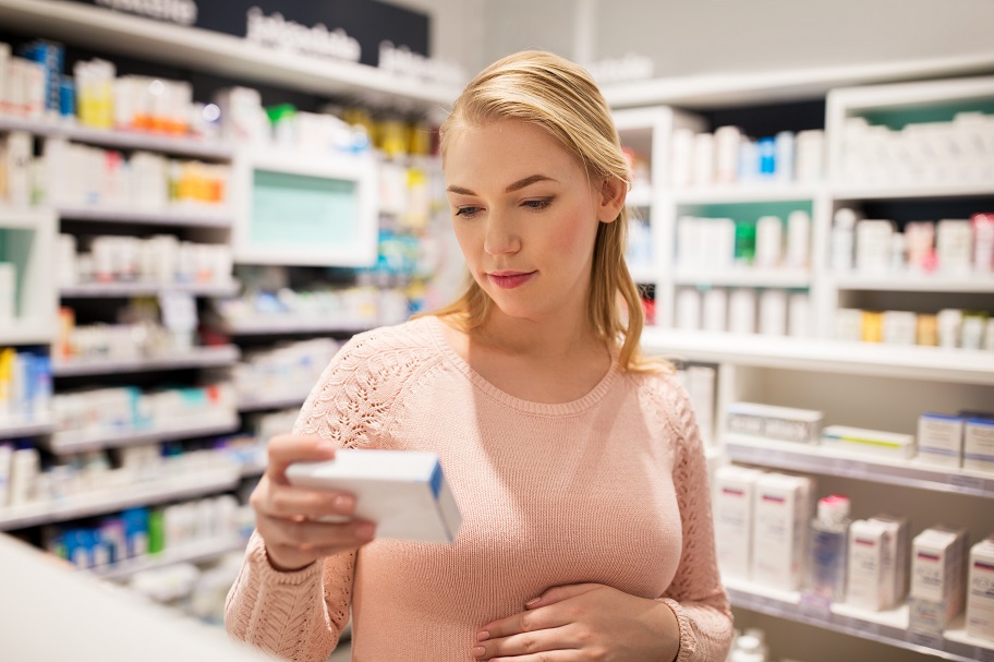 pregnant woman in pharmacy