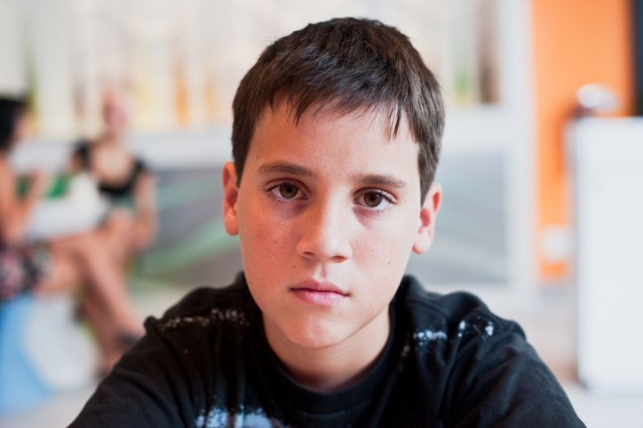 12-year old boy, sad face