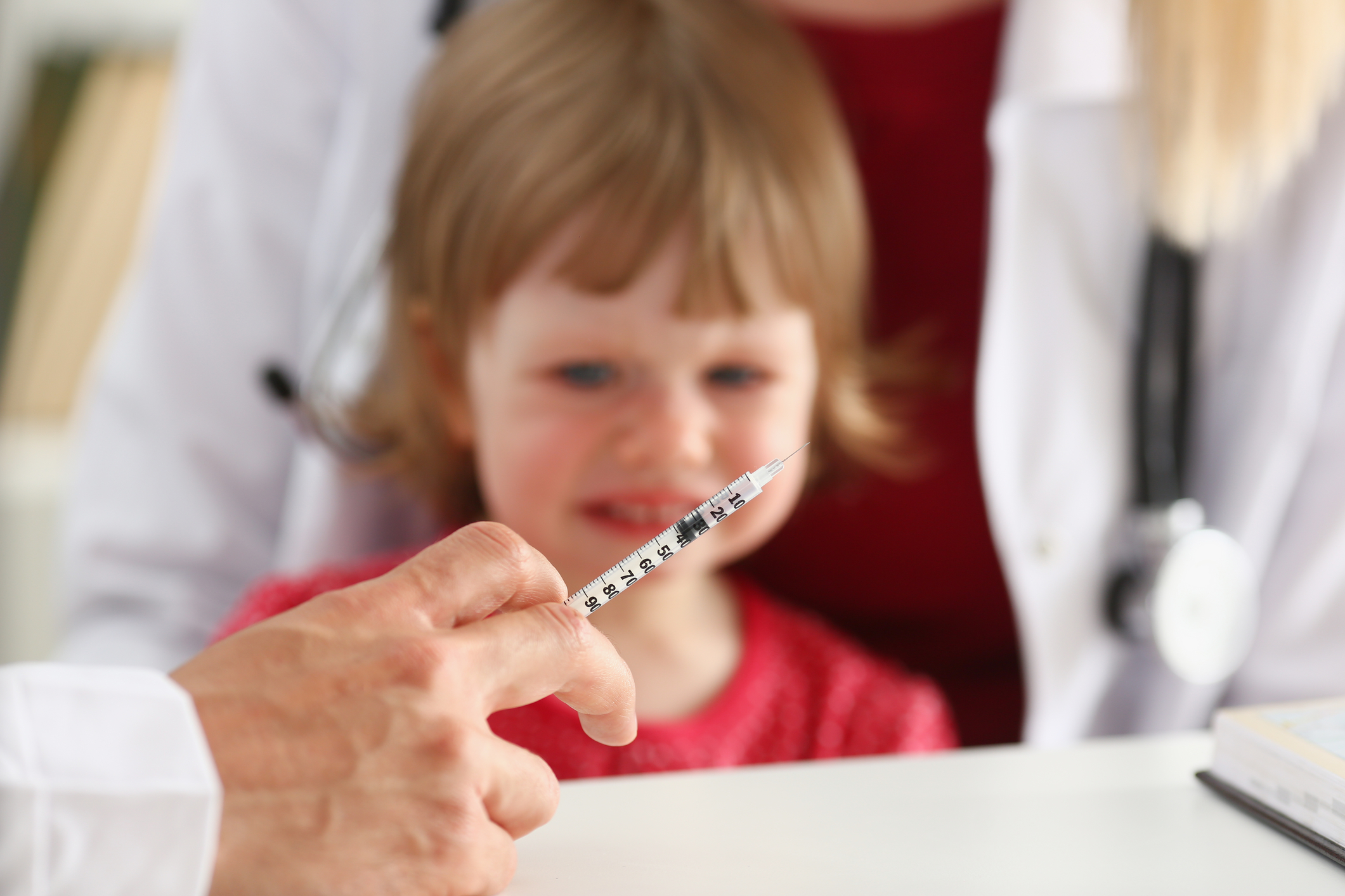 child getting injection