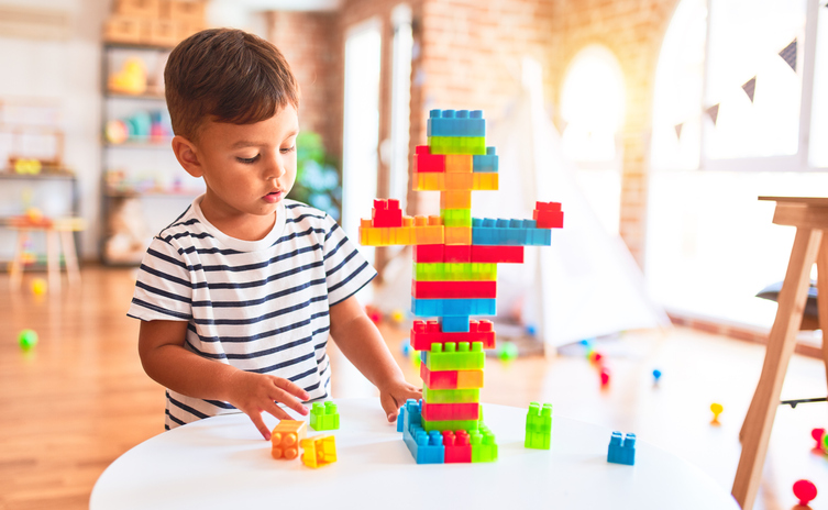 toddler playing with blocks