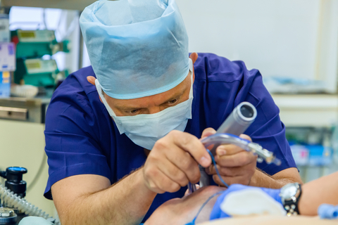 anaesthetist peforming tracheal intubation