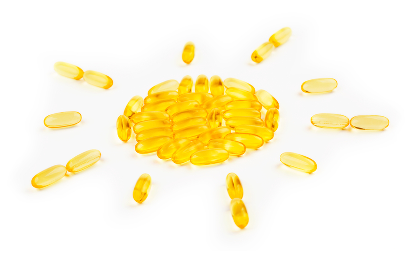 Vitamin pills in shape of sun