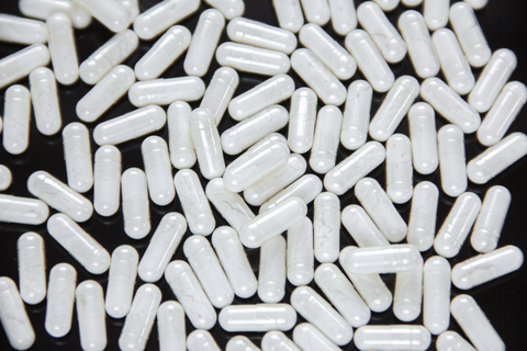 white capsules - enzyme tablets