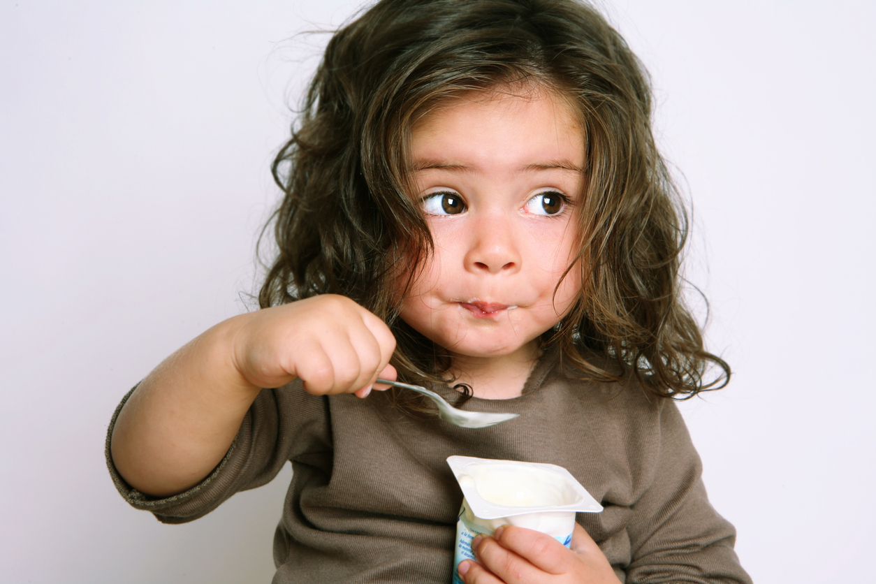 Child eating yoghurt