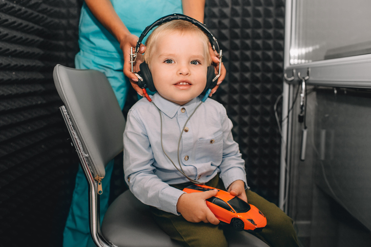 young boy hearing test